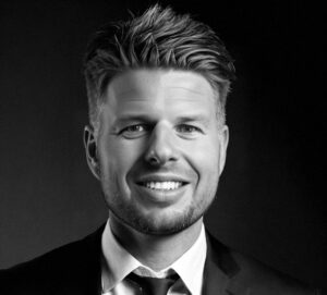 Picture of <a href="https://www.risb.dk/" target="_blank">   Kasper Holm, direktør & partner, Risb Forsikringsagentur </a>